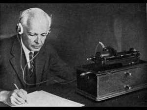 Béla Bartók notating music he collected in the field